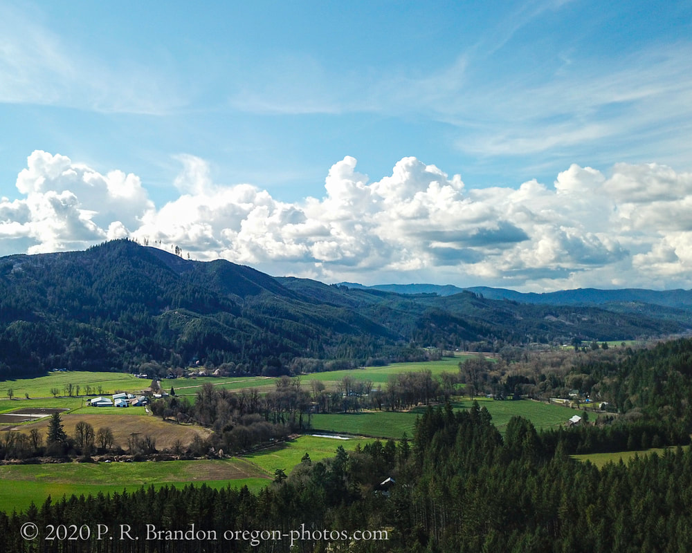 Photo of fields and hills taken from Creekwood Pl. in Washington County, Oregon